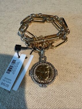 White House Black Market Gold and Silver Link Bracelet with Coin Charm